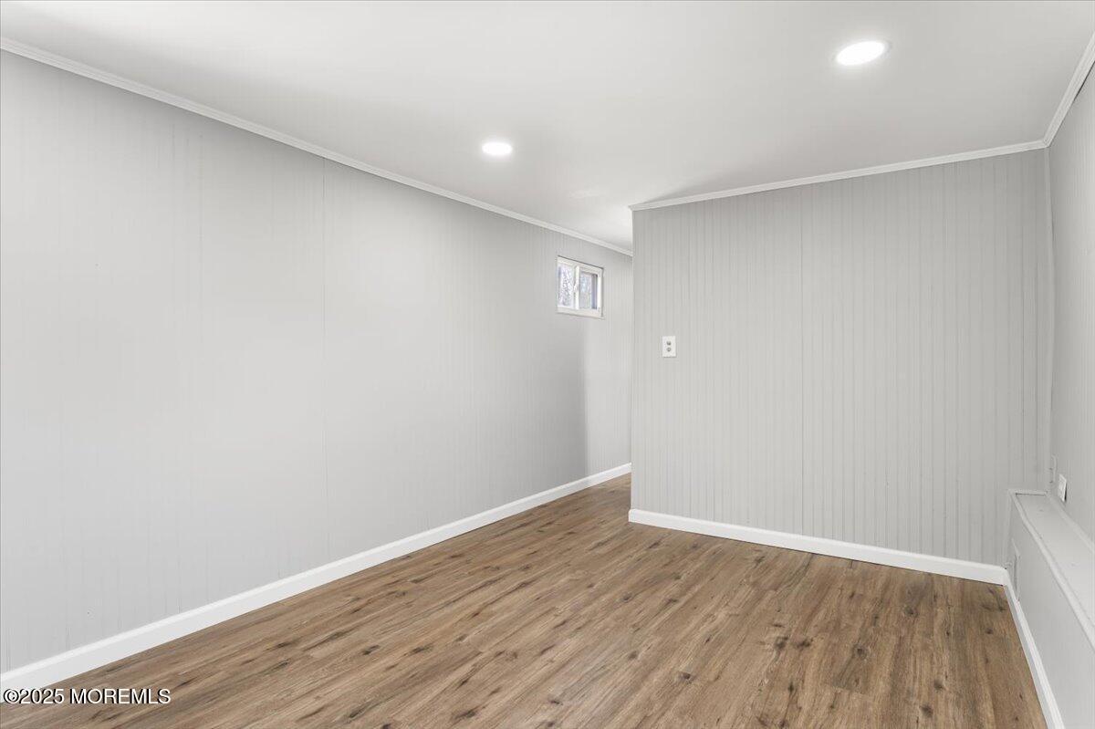 114 Cookstown New Egypt Road, Unit C7 Wrightstown, NJ 08562 - Photo 9 of 30 a view of an empty room with wooden floor