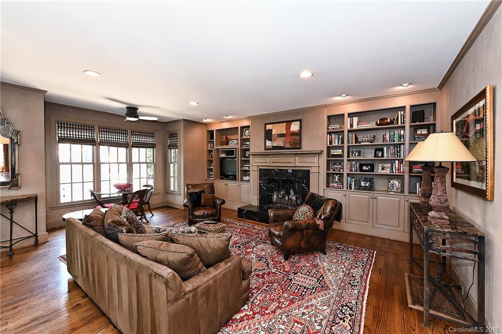1626 Queens Road West Charlotte, NC 28207 - Photo 12 of 36 a living room with furniture and a fireplace