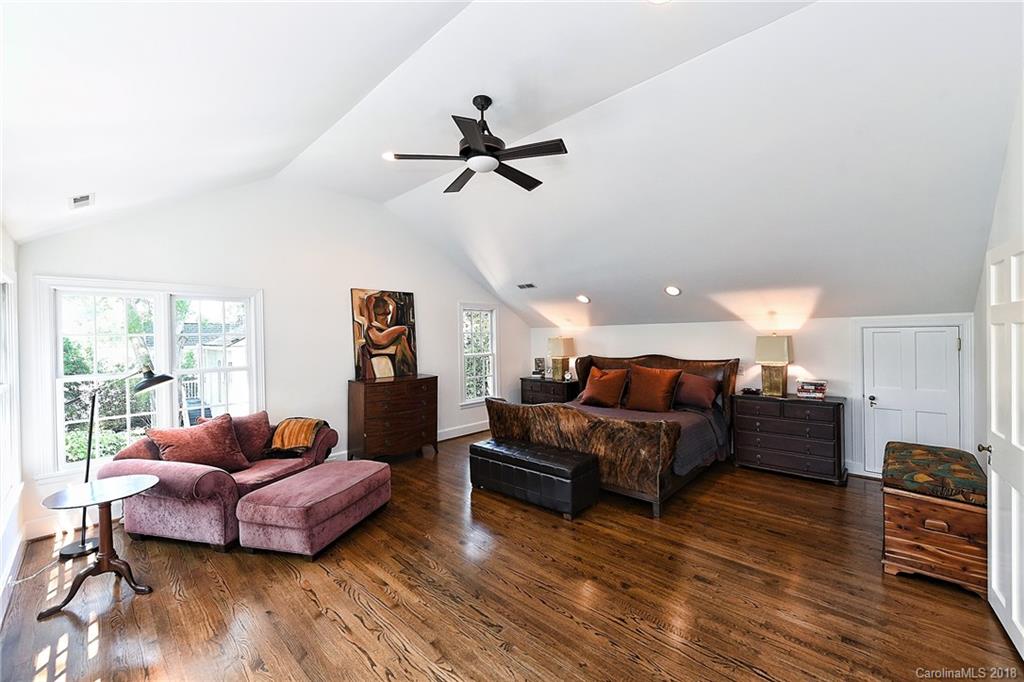 1626 Queens Road West Charlotte, NC 28207 - Photo 14 of 36 a living room with furniture a ceiling fan and a wooden floor