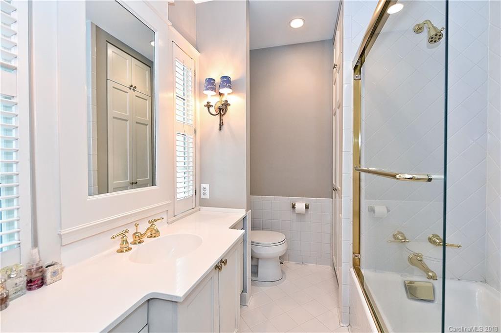 1626 Queens Road West Charlotte, NC 28207 - Photo 20 of 36 a bathroom with a sink toilet and shower