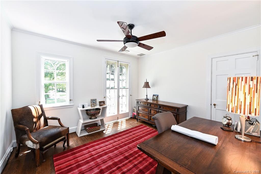 1626 Queens Road West Charlotte, NC 28207 - Photo 25 of 36 a living room with furniture and a wooden floor