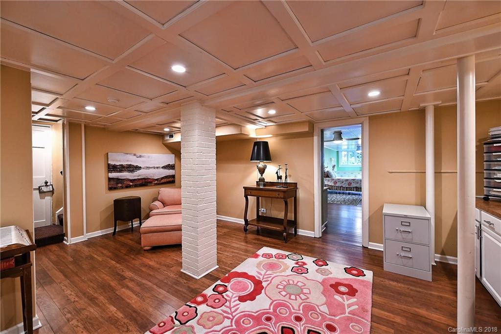 1626 Queens Road West Charlotte, NC 28207 - Photo 26 of 36 a living room with furniture and a wooden floor