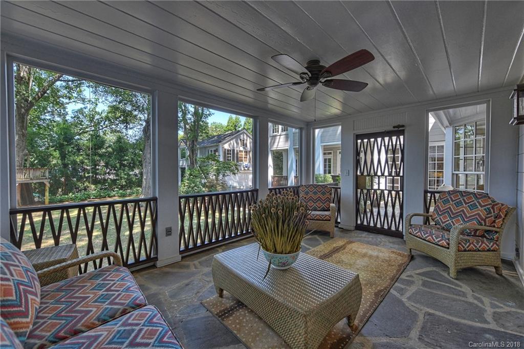 1626 Queens Road West Charlotte, NC 28207 - Photo 28 of 36 a living room with furniture and a large window