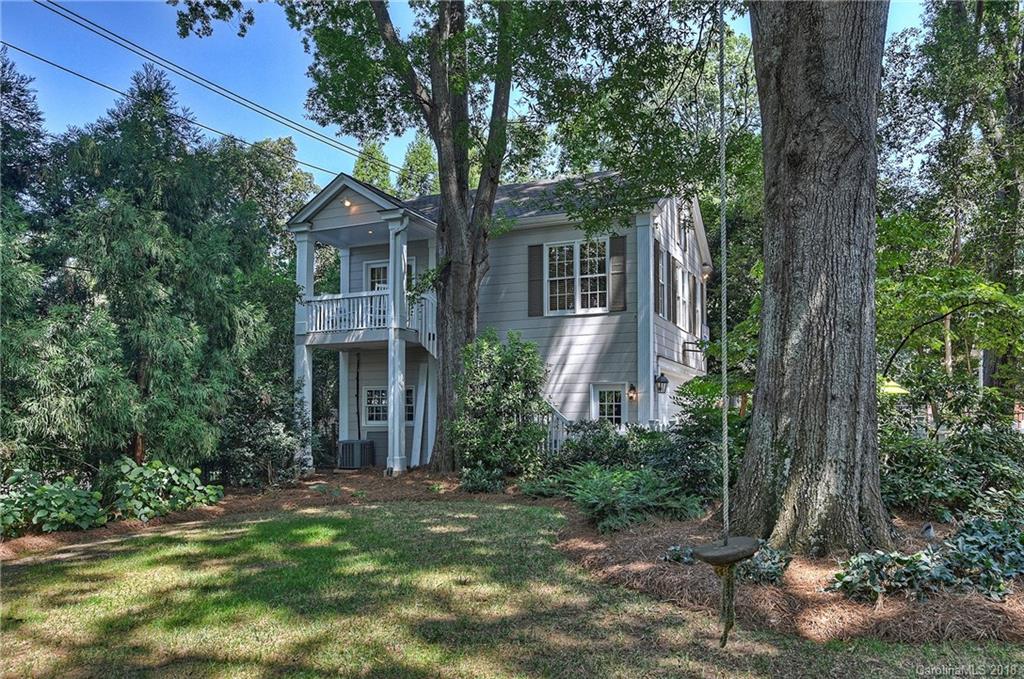 1626 Queens Road West Charlotte, NC 28207 - Photo 32 of 36 a front view of a house with a garden