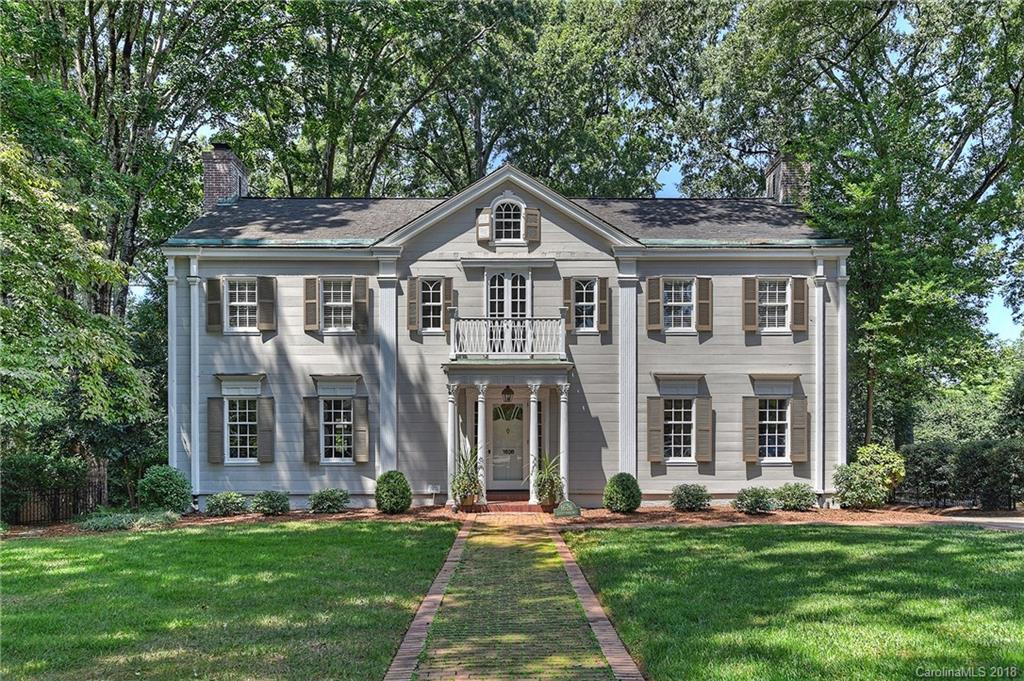 1626 Queens Road West Charlotte, NC 28207 - Photo 36 of 36 front view of a brick house with a yard