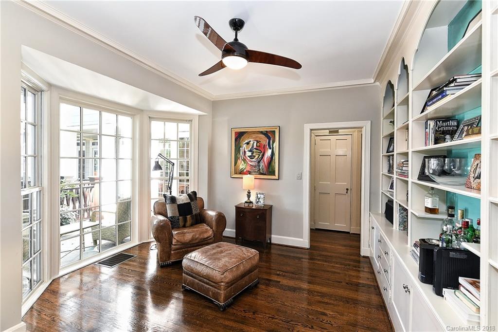 1626 Queens Road West Charlotte, NC 28207 - Photo 10 of 36 a living room with furniture or couch and a bookshelf