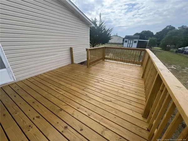 a view of a balcony with an outdoor space