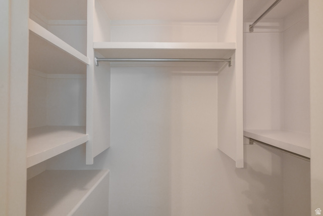 1735 West 540 North, Unit 1805 St. George, UT 84770 - Photo 47 of 64 Built-in closet system featuring white shelving and chrome hanging rods