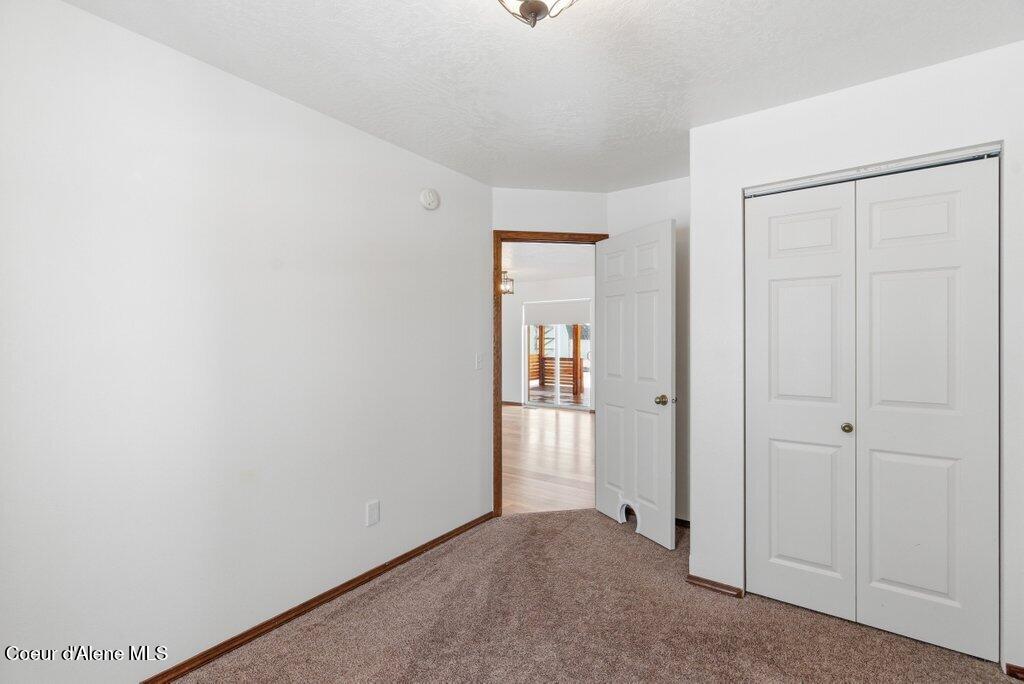 2444 North Sparrow Loop Post Falls, ID 83854 - Photo 14 of 39 Downstairs Bedroom