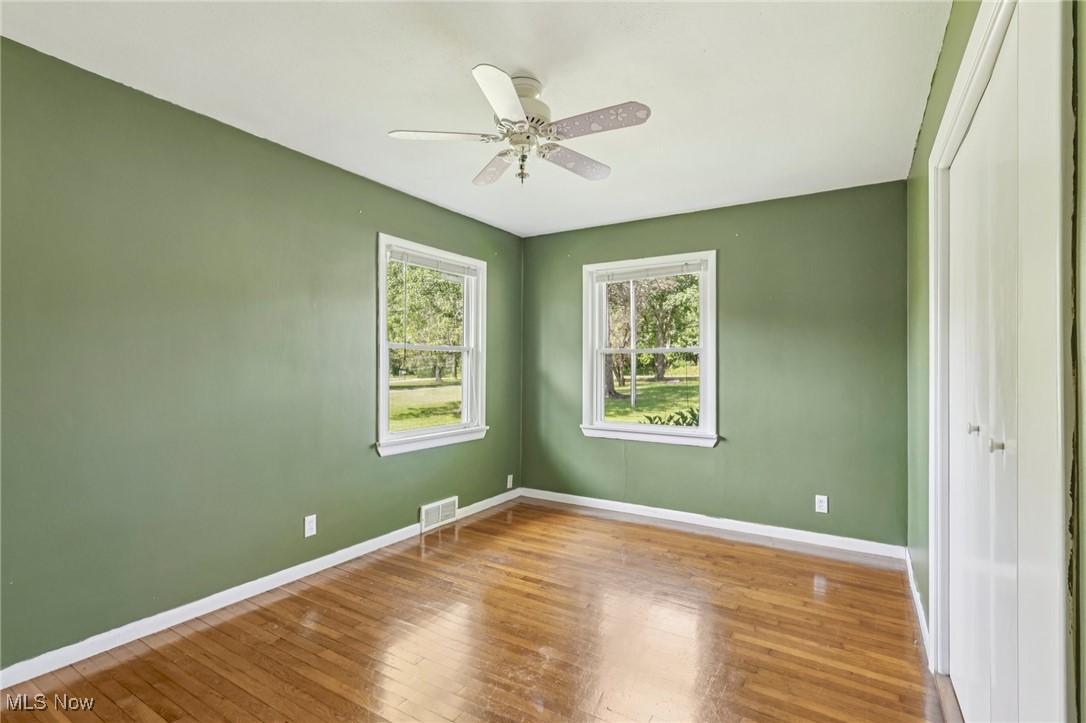 5097 Chillicothe Road Chagrin Falls, OH 44022 - Photo 33 of 45 Empty room featuring wood-type flooring and ceiling fan