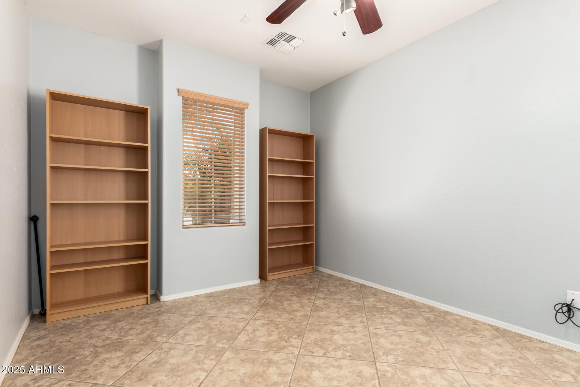 6756 South Seton Avenue Gilbert, AZ 85298 - Photo 22 of 37 a view of an empty room with a closet