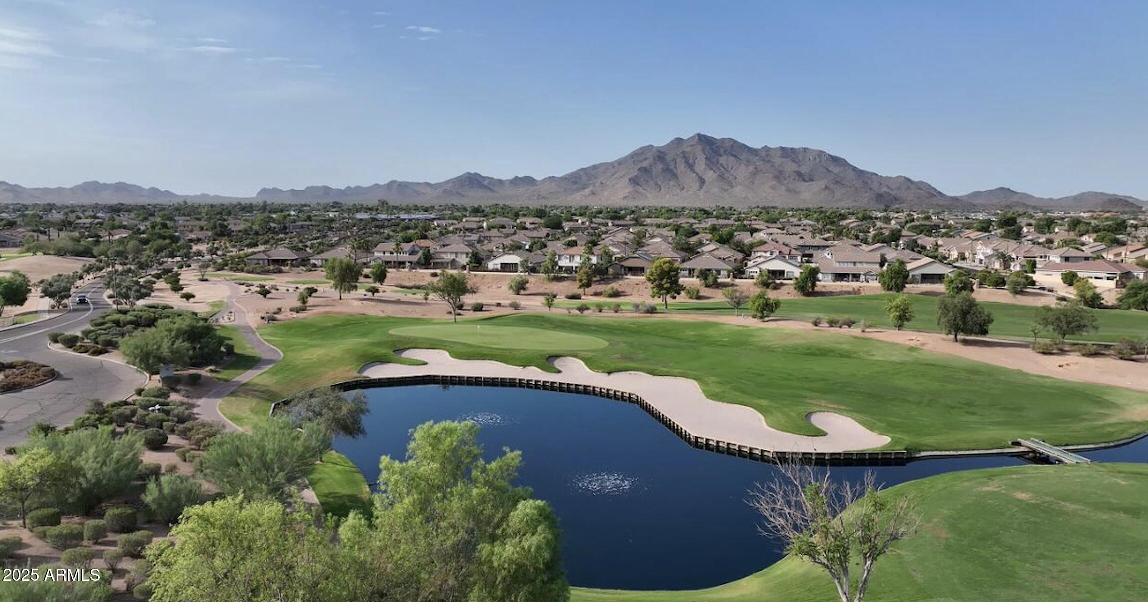 6756 South Seton Avenue Gilbert, AZ 85298 - Photo 34 of 37 an aerial view of a house with a garden and trees