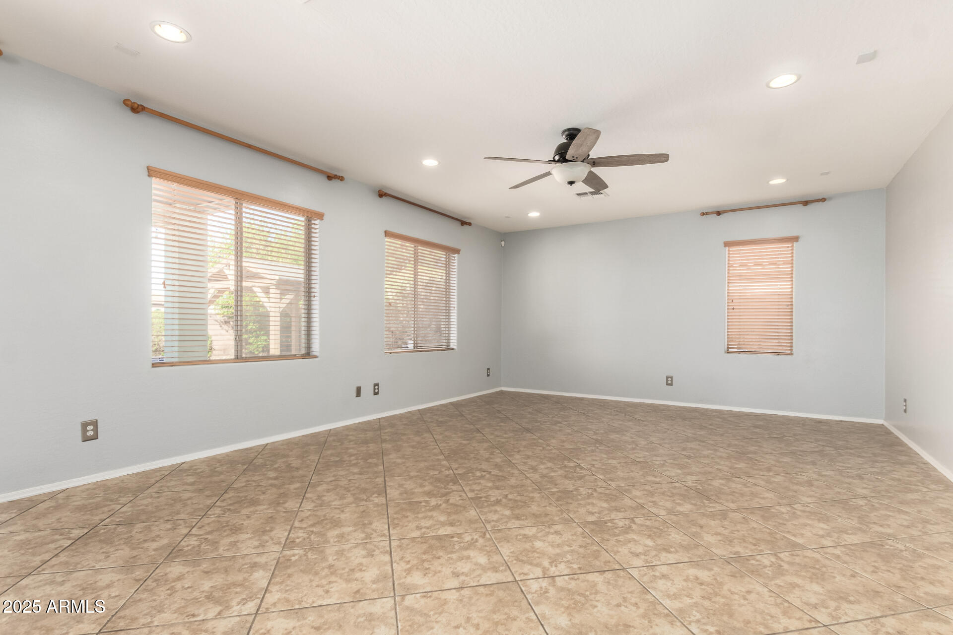 6756 South Seton Avenue Gilbert, AZ 85298 - Photo 5 of 37 a view of an empty room with a window