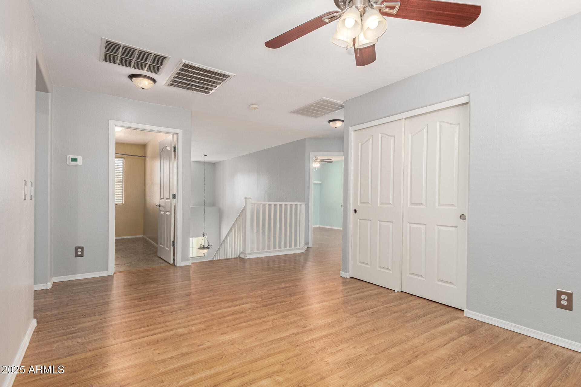 6756 South Seton Avenue Gilbert, AZ 85298 - Photo 10 of 37 a view of empty room with wooden floor