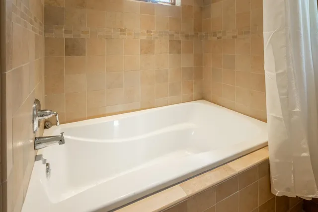 a bathroom with a bathtub