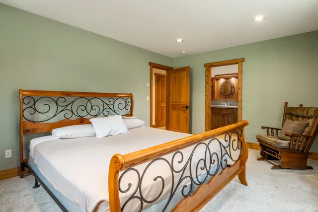 a bedroom with a bed and furniture