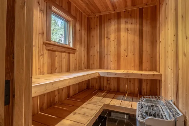 a bathroom with a sink and a window