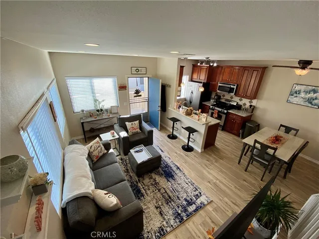 a living room with furniture or couch and a flat screen tv