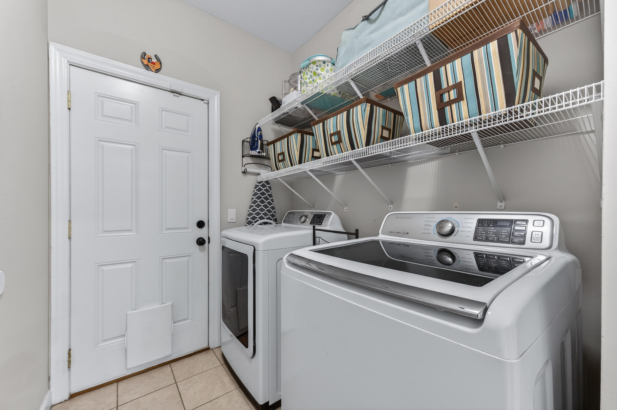 6022 Hidden Valley Road Crestview, FL 32539 - Photo 41 of 60 a utility room with dryer and washer