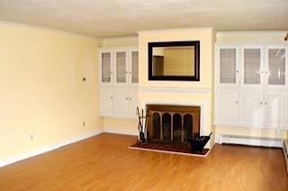 23 Intervale Road Kennebunk, ME 04043 - Photo 7 of 29 Living room fireplace with built-ins