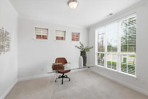 a view of a livingroom with furniture