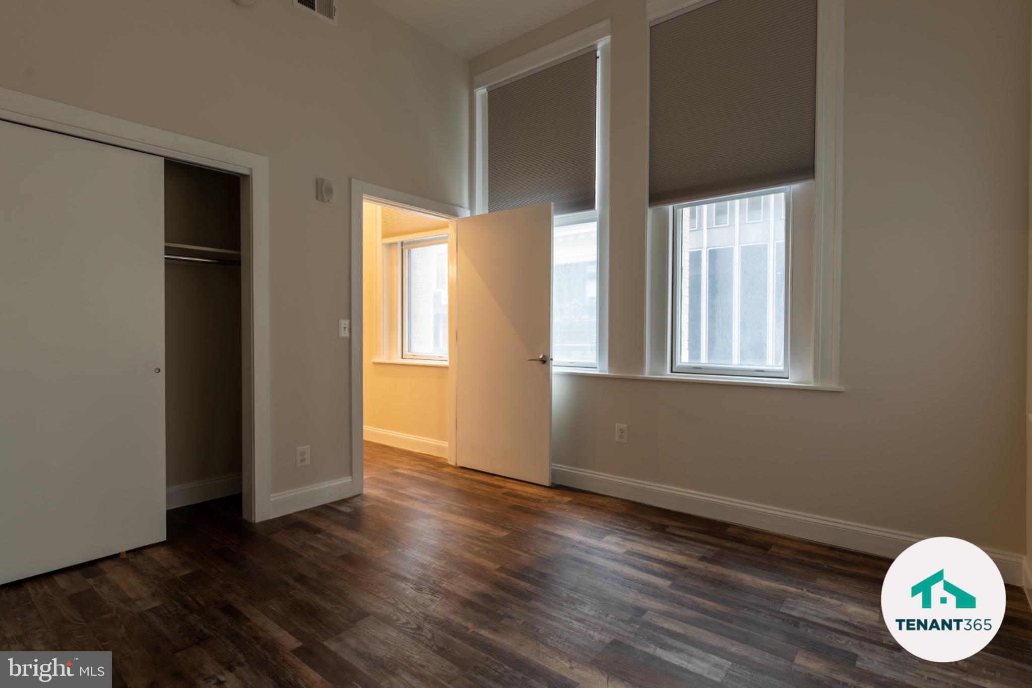 8 East Fayette Street, Unit 201 Baltimore, MD 21202 - Photo 9 of 14 Bright and airy room with natural light.