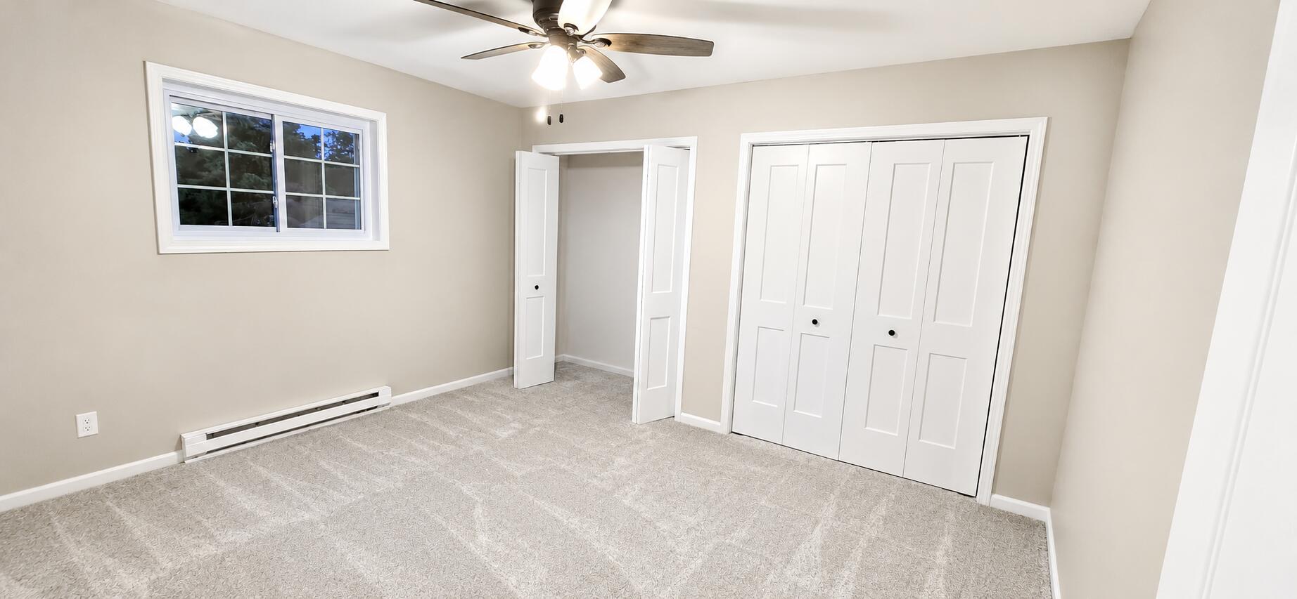 501 Slinger Road, Unit E 2 Slinger, WI 53086 - Photo 10 of 11 Bedrooms feature double closets