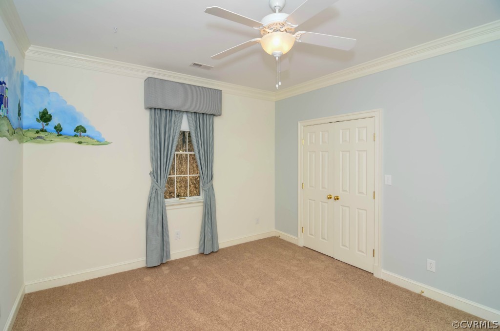 1933 Covington Road Crozier, VA 23039 - Photo 14 of 24 an empty room with chandelier fan and closet