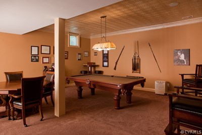 1933 Covington Road Crozier, VA 23039 - Photo 19 of 24 a room with furniture pool table and a chandelier