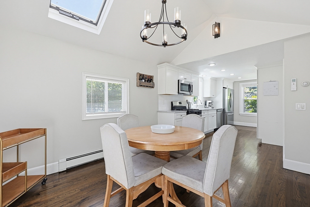 345 Sherman Street Canton, MA 02021 - Photo 11 of 42 a view of a dining room with furniture window and wooden floor