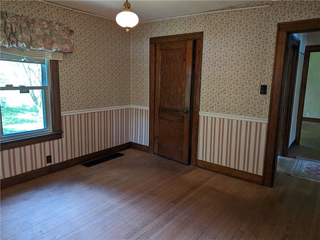 488 Highland Ridge Road Claysville, PA 15323 - Photo 17 of 29 a view of a hallway with wooden floor and windows