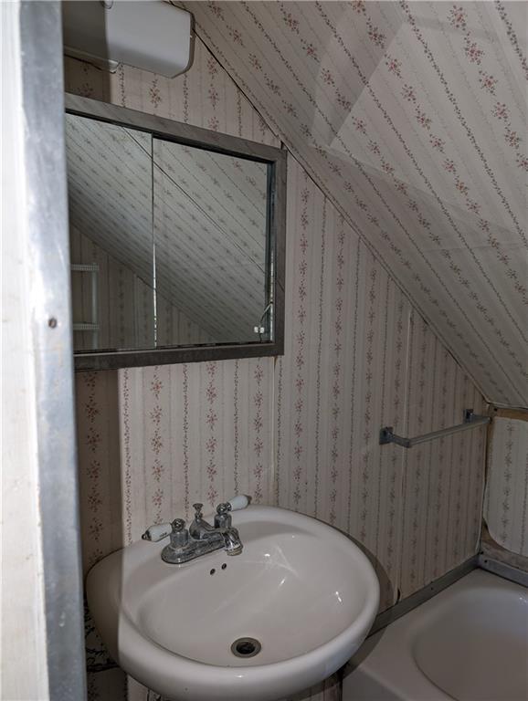 488 Highland Ridge Road Claysville, PA 15323 - Photo 29 of 29 a bathroom with a sink and a mirror