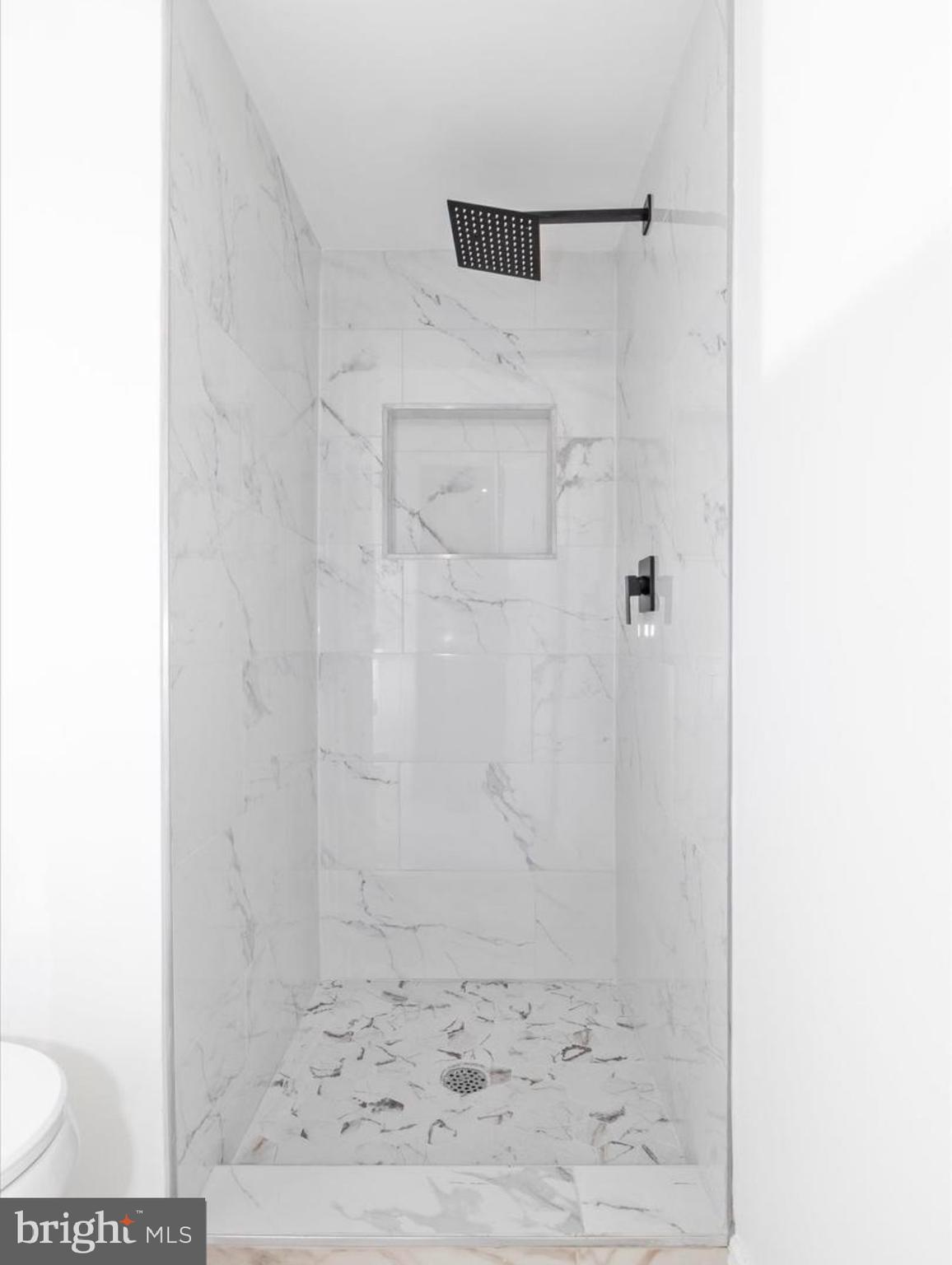 3930 Ferrara Drive Silver Spring, MD 20906 - Photo 13 of 15 a bathroom with a shower