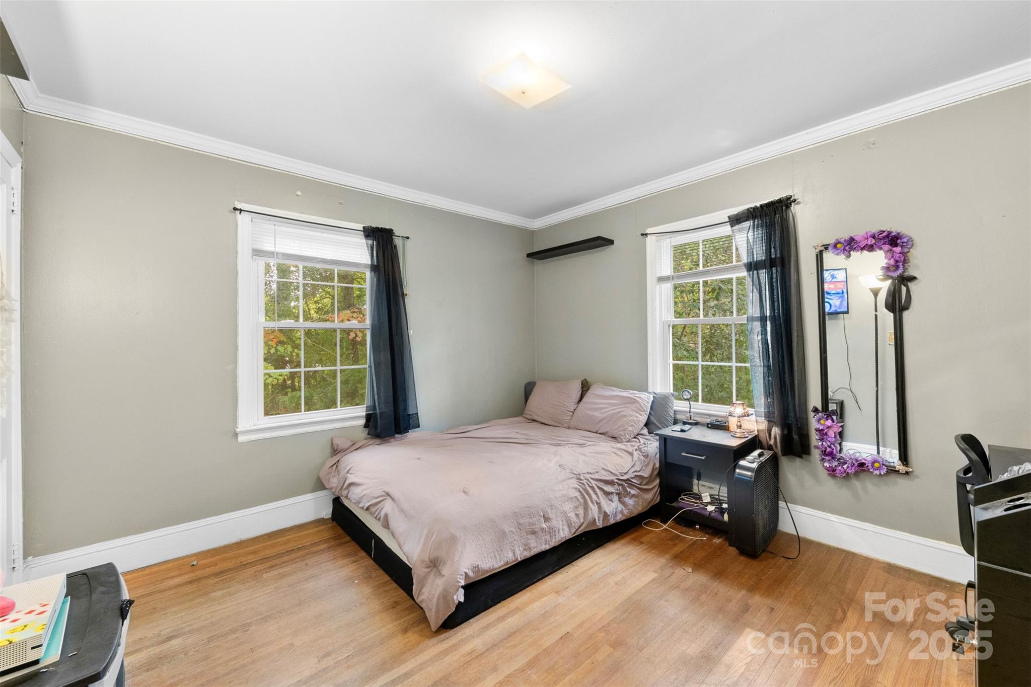 310 South Main Street Stanley, NC 28164 - Photo 20 of 22 a bedroom with a bed and a window