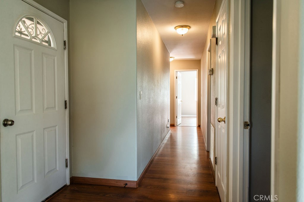 5085 Boyer Road Mariposa, CA 95338 - Photo 29 of 75 a view of a hallway with wooden floor