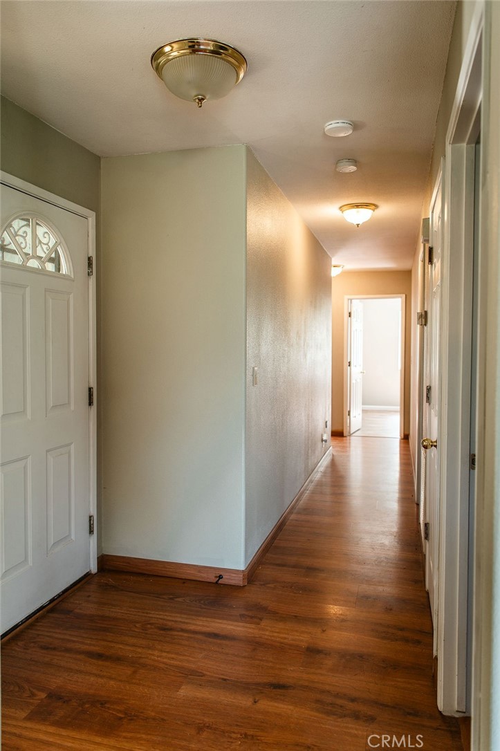 5085 Boyer Road Mariposa, CA 95338 - Photo 30 of 75 a view of a hallway with wooden floor