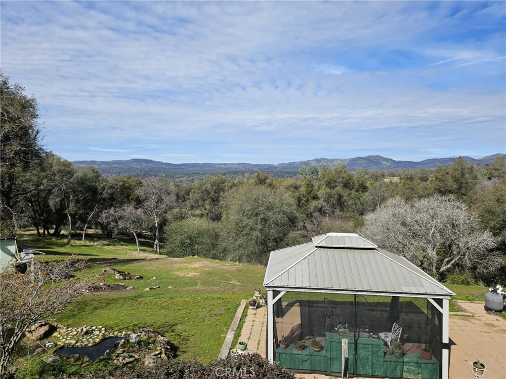 5085 Boyer Road Mariposa, CA 95338 - Photo 3 of 75 a view of a big house with a big yard