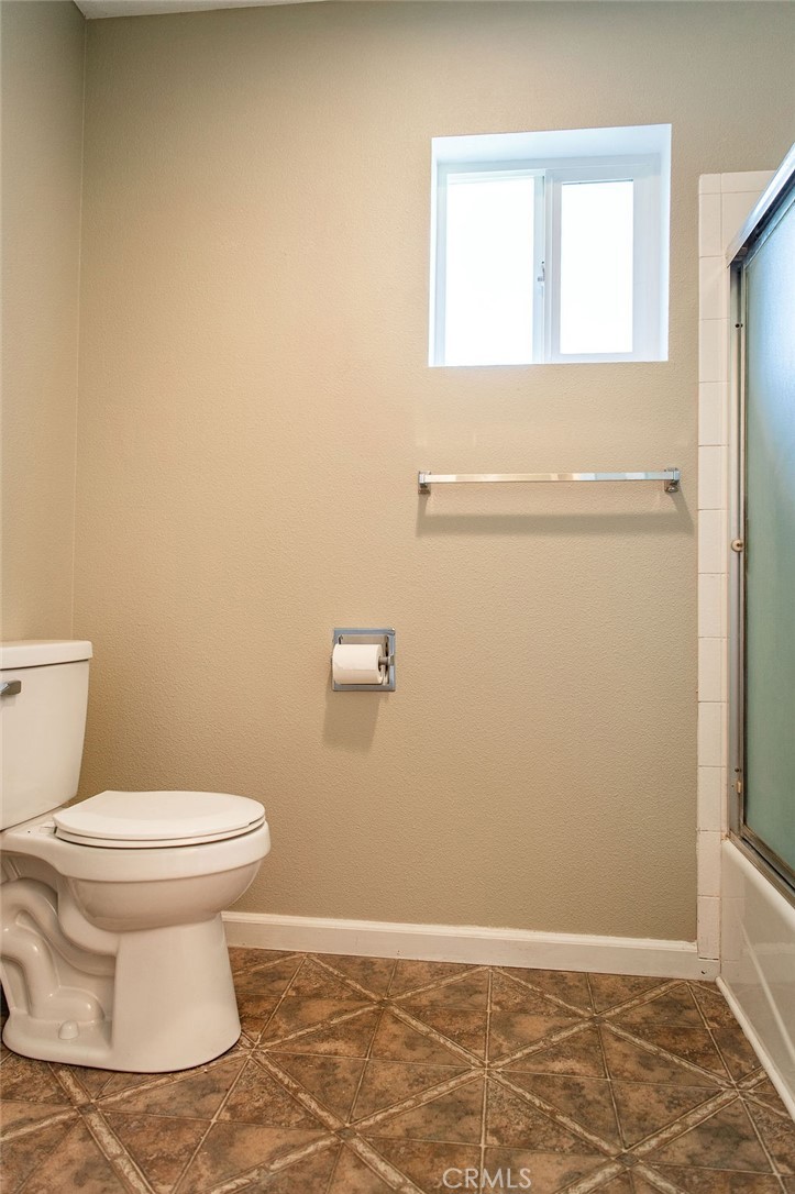 5085 Boyer Road Mariposa, CA 95338 - Photo 35 of 75 a bathroom with a toilet and a sink