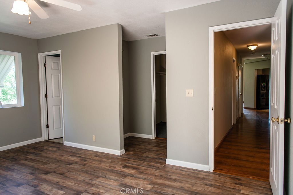 5085 Boyer Road Mariposa, CA 95338 - Photo 39 of 75 a view of a hallway with wooden floor and closet area