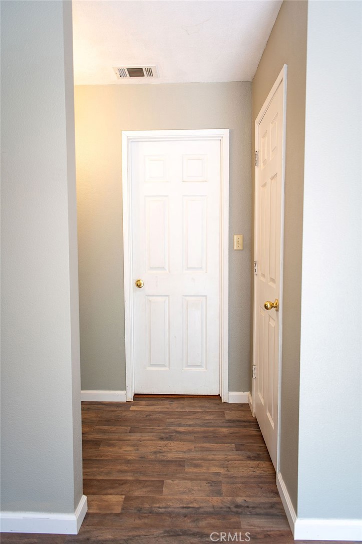 5085 Boyer Road Mariposa, CA 95338 - Photo 44 of 75 a view of an empty room with wooden floor