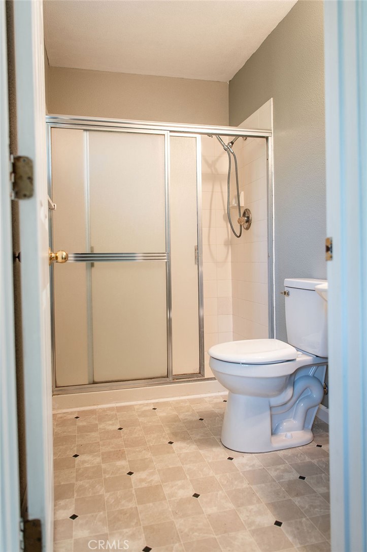 5085 Boyer Road Mariposa, CA 95338 - Photo 48 of 75 a bathroom with a toilet and a shower