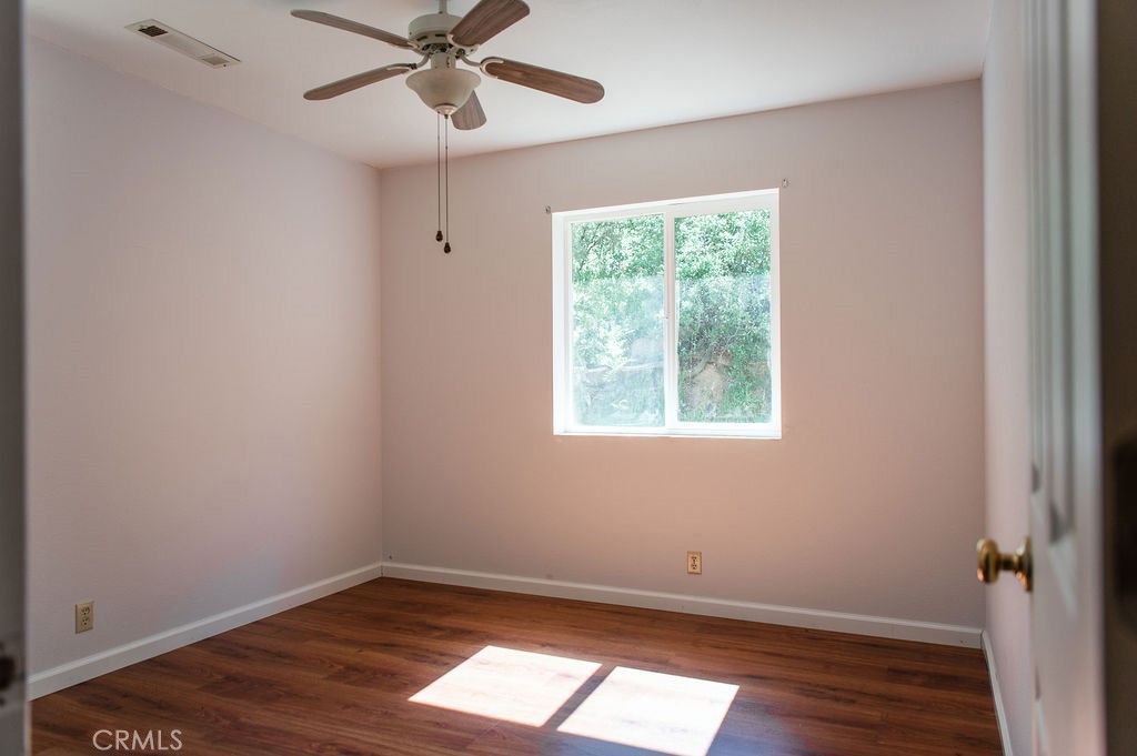 5085 Boyer Road Mariposa, CA 95338 - Photo 51 of 75 wooden floor in an empty room with a window