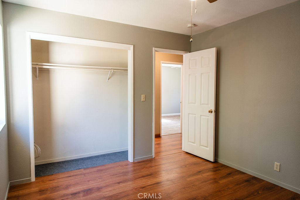 5085 Boyer Road Mariposa, CA 95338 - Photo 56 of 75 a view of an empty room with wooden floor