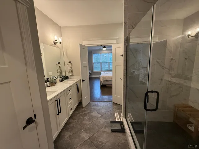 a bathroom with a sink and mirror