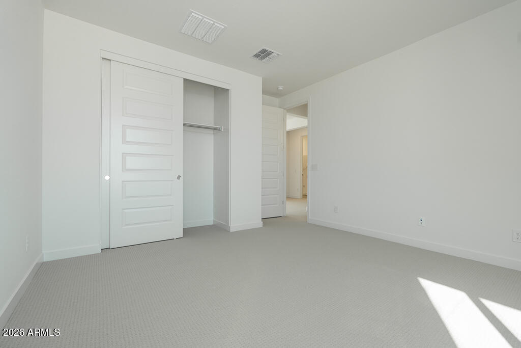 5857 South Granite Street Gilbert, AZ 85298 - Photo 13 of 20 an empty room with closet area
