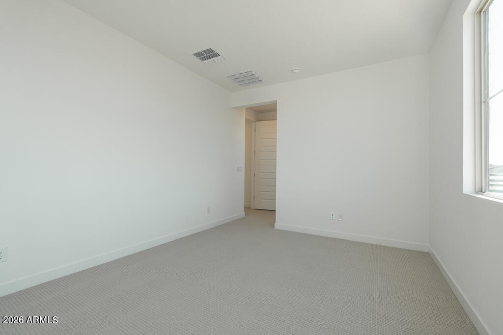 5857 South Granite Street Gilbert, AZ 85298 - Photo 15 of 20 an empty room with a window