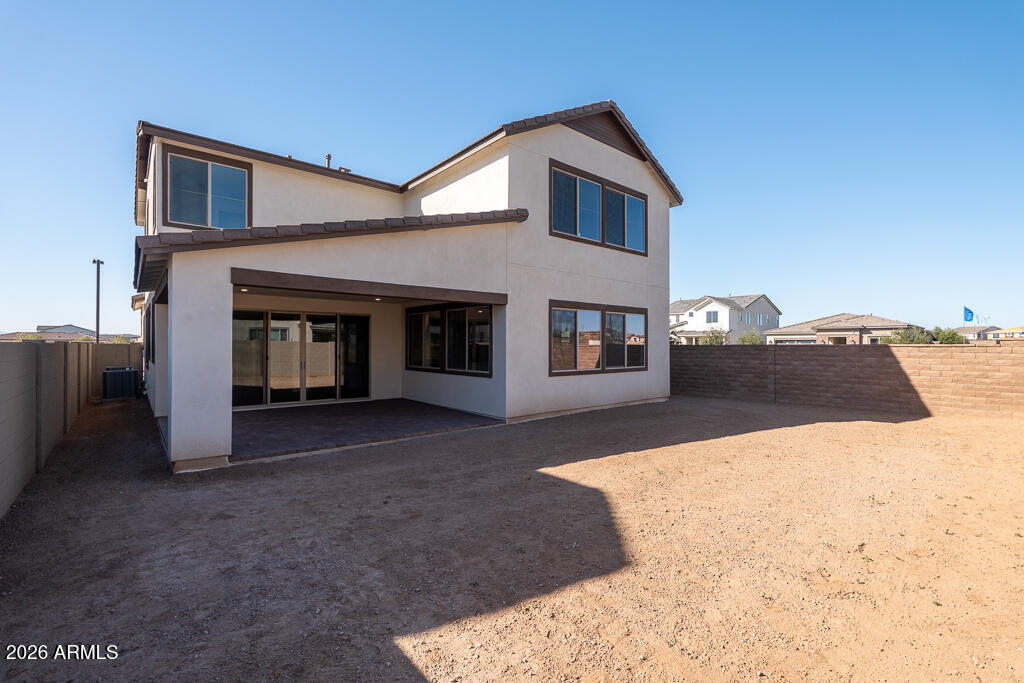 5857 South Granite Street Gilbert, AZ 85298 - Photo 19 of 20 a view of a house with a yard