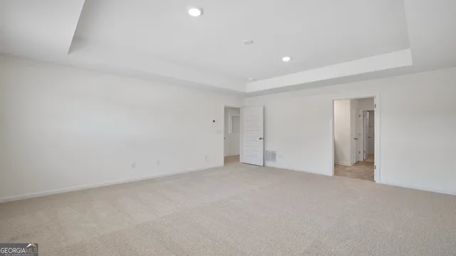 a bathroom with a sink double vanity and a mirror