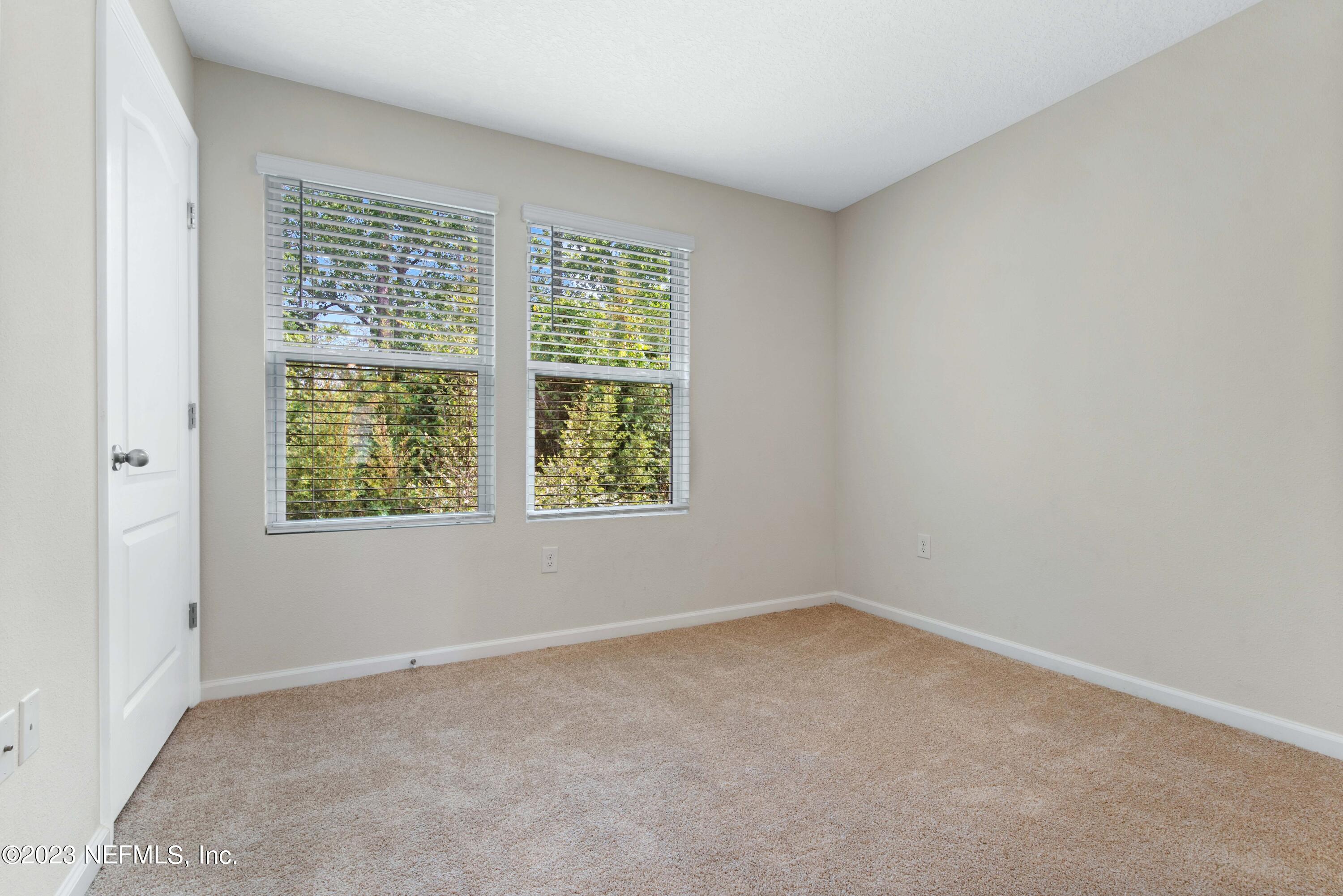 920 Rotary Road Jacksonville, FL 32211 - Photo 10 of 15 an empty room with a window