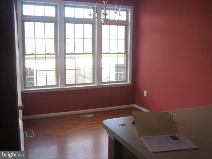 2514-5 Five Shillings Road Frederick, MD 21701 - Photo 17 of 17 a room with furniture and a window